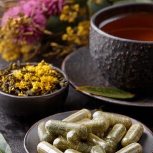 herbal capsules and teas on a table
